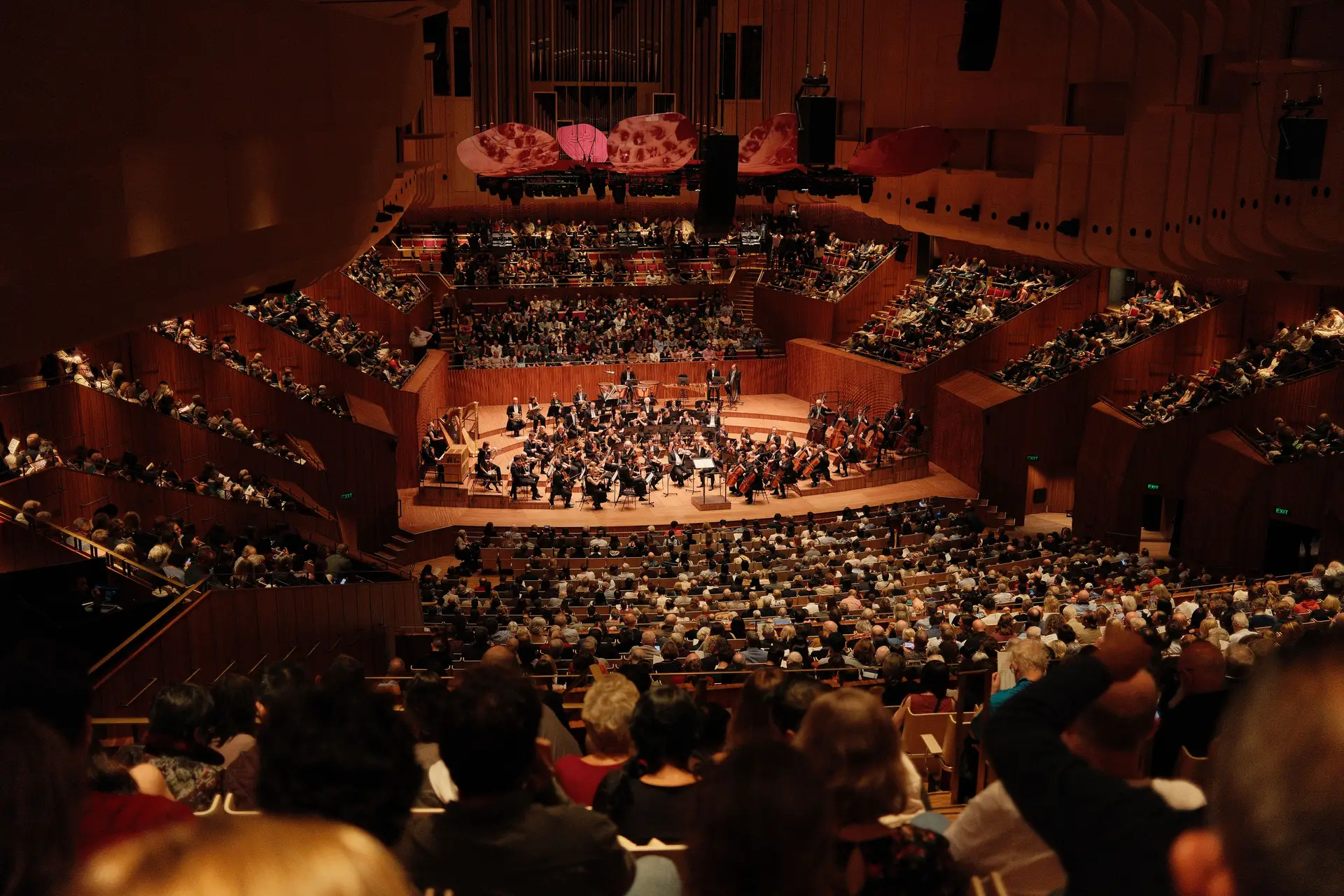 Audience enjoying a symphony performance at the Sydney Opera House